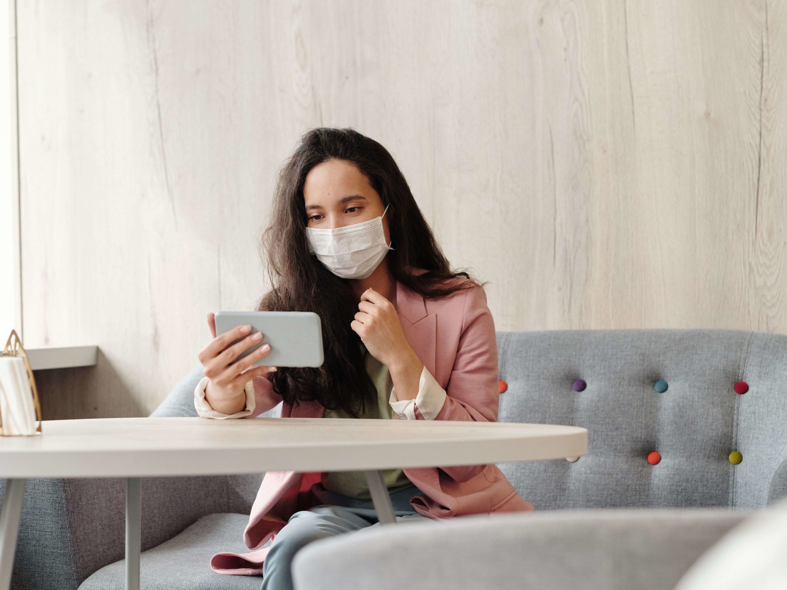 Woman using her phone for a video call