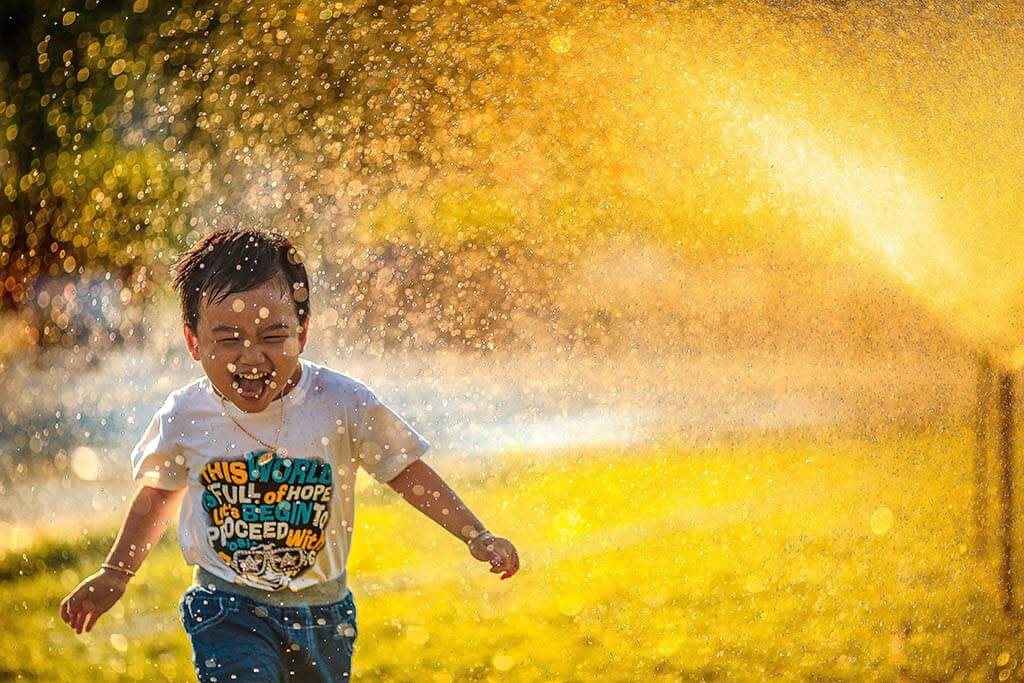 Child running while laughing