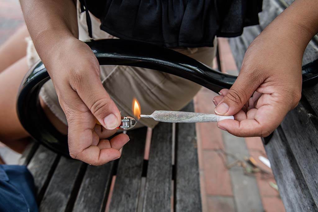 someone lighting a weed joint; what are the benefits of not smoking weed?