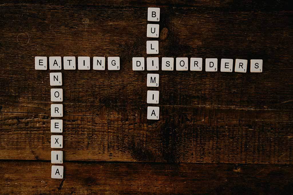 scrabble letters spelling anorexia, bulimia, and eating disorders