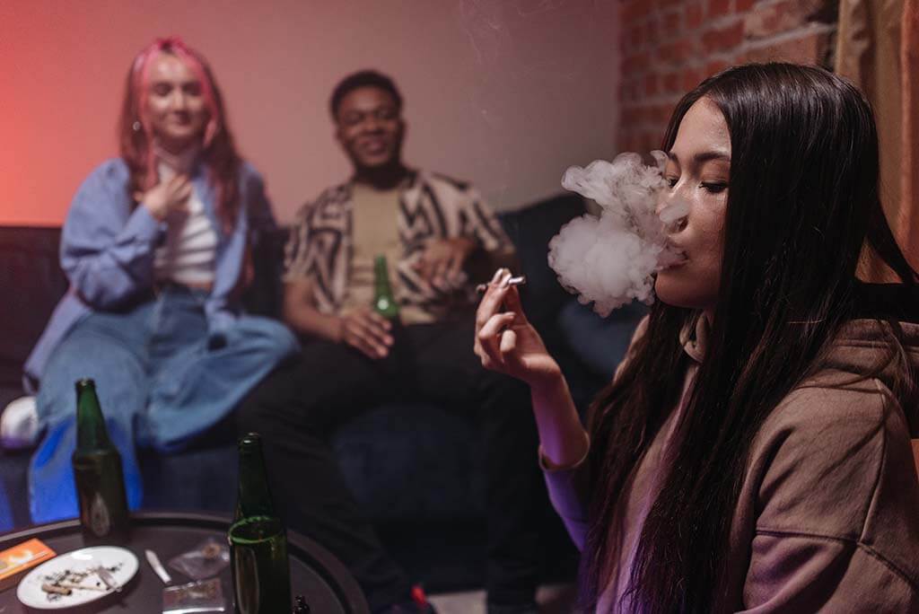 group of friends sharing a joint