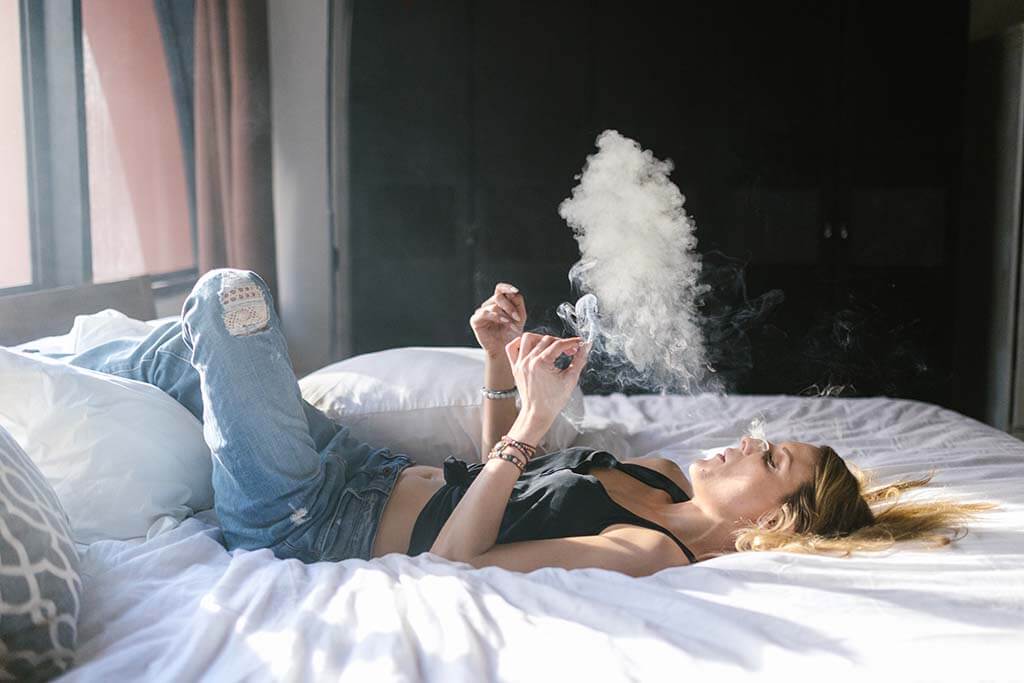 Woman smoking weed while on Zoloft