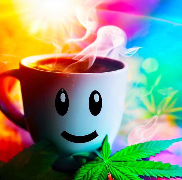 A cup of coffee with a smiley face and a marijuana leaf