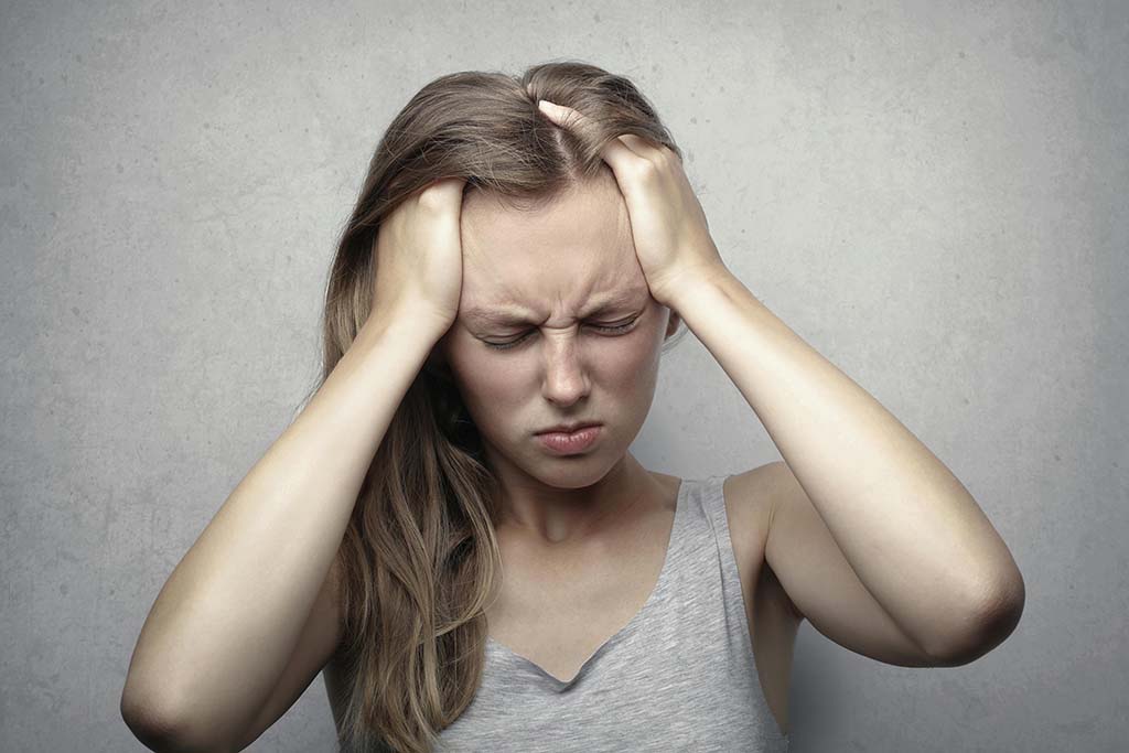 Woman experiencing neuropathic pain