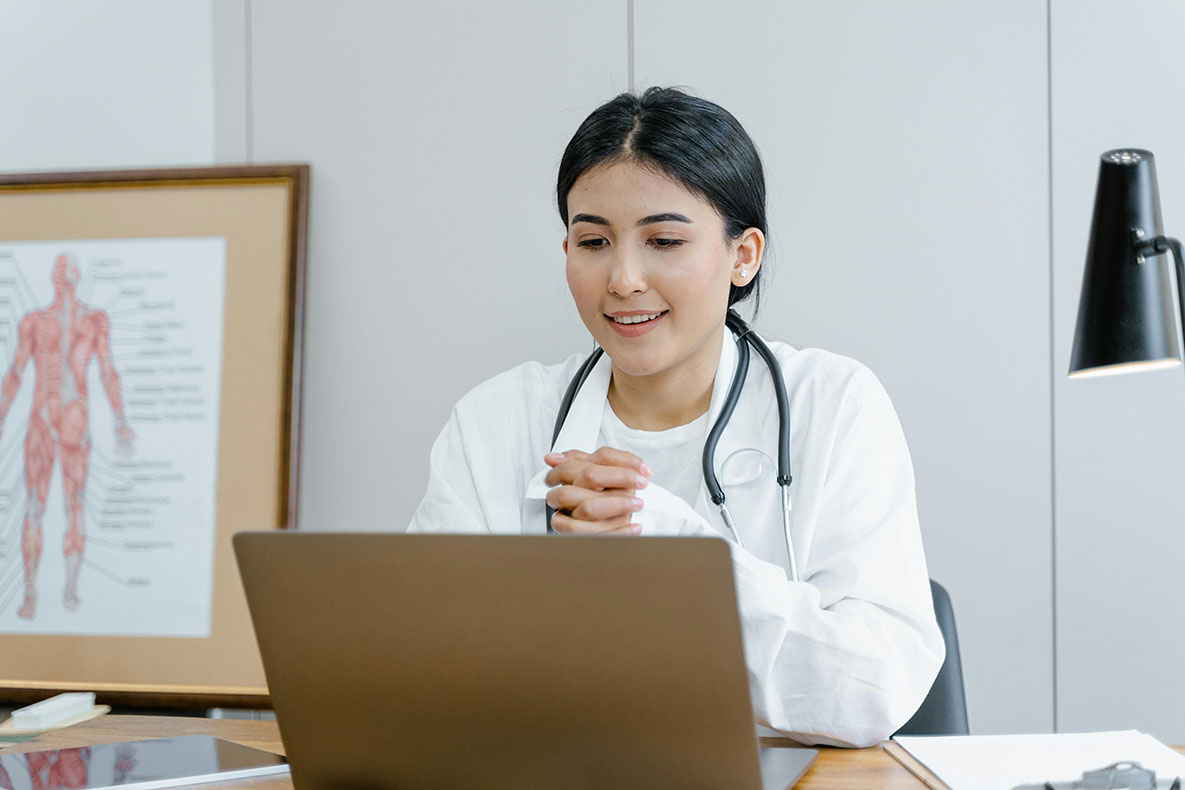 A medical marijuana doctor having a telemedicine appointment on her laptop